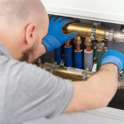 professional-plumber-installing-plumbing-manifolds-2022-12-14-03-50-58-utc-scaled-67f8451d4e4b8